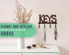 Key Holder for Wall - Decorative Farmhouse Rustic Wall Mount Key Organizer with 4 Hooks - Vintage Cast Iron Key Rack with Screws and Anchors – 6x8 - Copper with Black – lifestyle in living room – Comfify