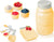 Mason Jar Kitchenware Set – Yellow Ceramic Decor with 4 Measuring Cups, 4 Measuring Spoons, Spoon Rest – front view – Comfify