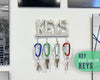 Key Holder for Wall - Decorative Farmhouse Rustic Wall Mount Key Organizer with 4 Hooks - Vintage Cast Iron Key Rack with Screws and Anchors – 6x8 - White – back view – Comfify