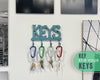 Cast Iron Key Holder – Decorative Farmhouse Wall Organizer with 4 Hooks, Screws & Anchors – scale comparison – Comfify